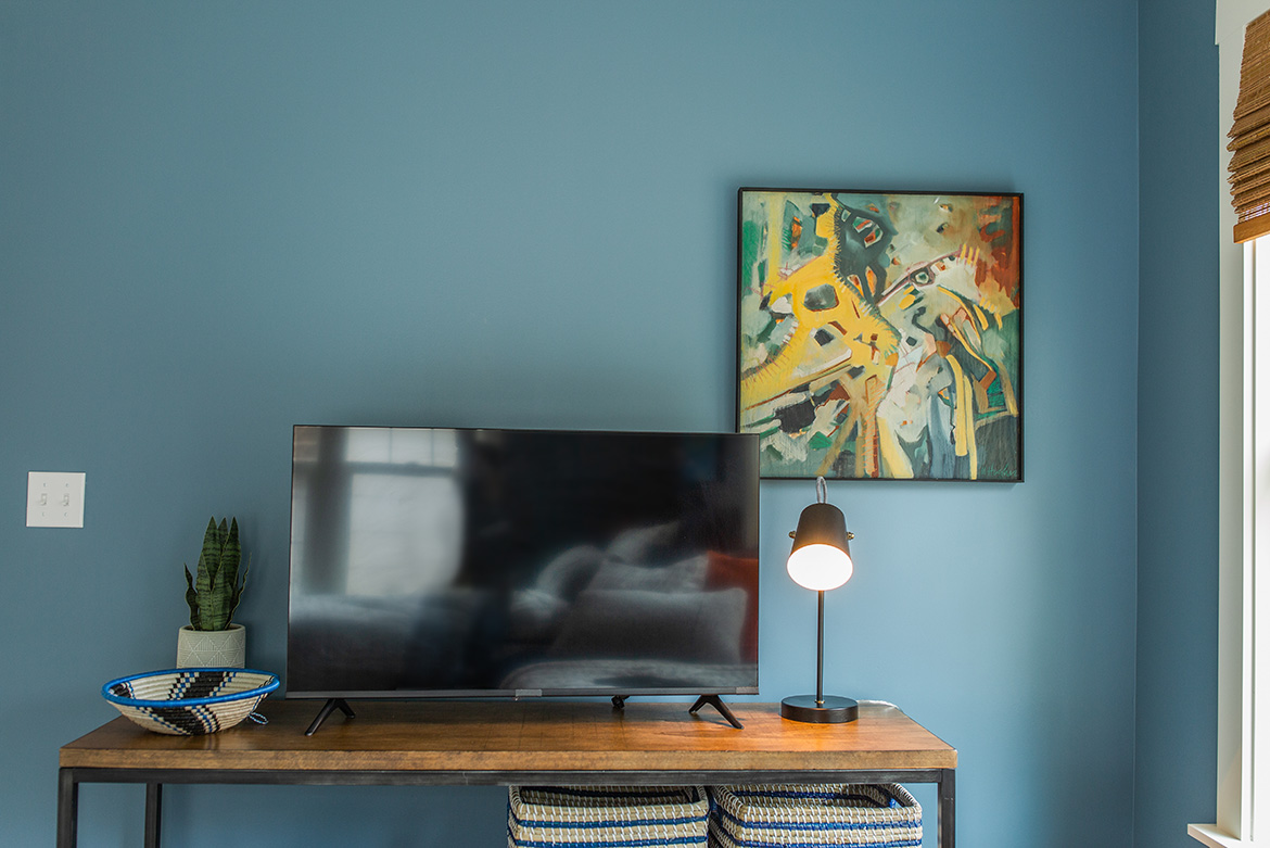 As seen on HGTV’s Hometown Season 7, Ben and Erin used Valspar’s "Cornflower Blue" paint in a eggshell finish for the boy's bedroom walls of the Hollingsworth Home. Paint Code: 4008-4B. On the trim and ceiling, Valspar's Statuesque was used in semi-gloss and flat finishes. Paint Code: 7002-5.