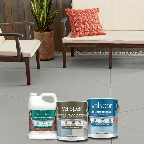 Gray cement patio, a modern outdoor couch and chair, plus Valspar Porch, Floor, and Patio products.