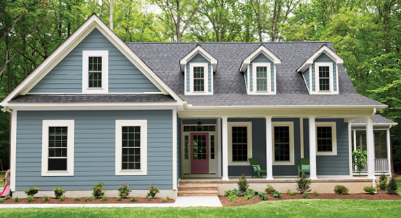 Quaint Cornflower Blue home with Bistro White trim and bright, welcoming Red Henna front door.