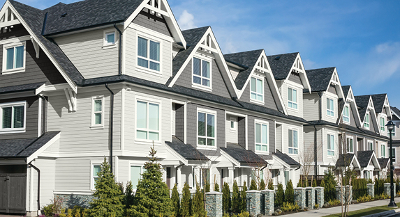 Townhomes with alternating use of Rugged Suede and Ocean Storm exterior colors and Du Jour trim on all. 