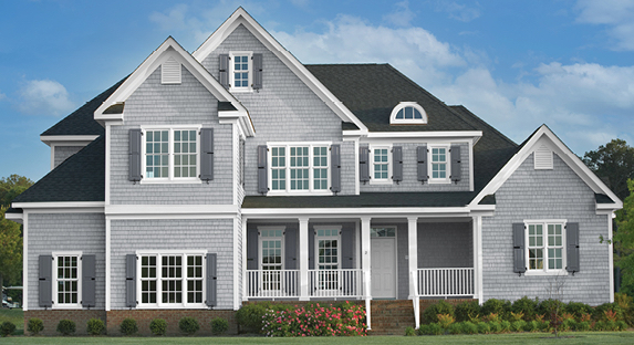 Large Gravity Gray home with porch, Crucible shutters and Ultra White trim, windows and columns.