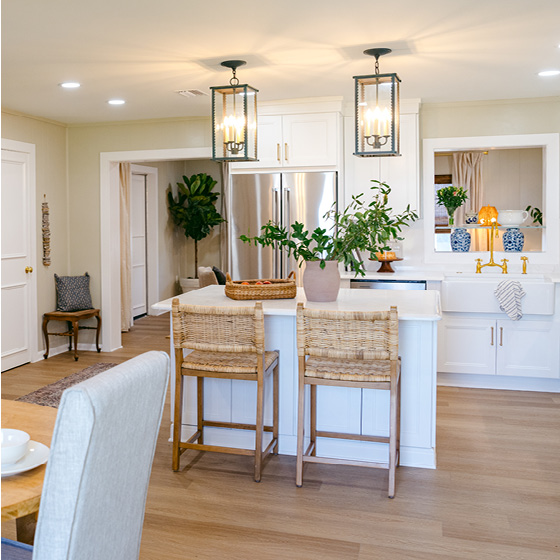 Six-image carousel of living room, child’s room, entryway, backyard and kitchen, all incorporating Renew Blue.