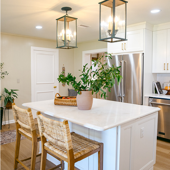 Six-image carousel of living room, child’s room, entryway, backyard and kitchen, all incorporating Renew Blue.